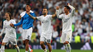 MADRID, SPAIN - MAY 04: Cristiano Ronaldo of Real Madrid celebrates the win with Jese, Raphael Varane and Luka Modric of Real Madrid during the UEFA Champions League Semi Final second leg match between Real Madrid and Manchester City FC at Estadio Santiago Bernabeu on May 4, 2016 in Madrid, Spain. (Photo by Catherine Ivill - AMA/Getty Images)