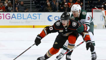 ANAHEIM, CA - NOVEMBER 9: Pontus Aberg #20 of the Anaheim Ducks battles for the puck against Joel Eriksson Ek #14 of the Minnesota Wild during the game on November 9, 2018 at Honda Center in Anaheim, California. (Photo by Debora Robinson/NHLI via Getty Images)