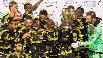 Nov 29, 2015; Harrison, NJ, USA; The Columbus Crew win the Eastern Conference Championship and raise the trophy as they celebrate their victory against the New York Red Bulls at Red Bull Arena. The Columbus Crew won with an aggregate score of 2-1. Mandatory Credit: Bill Streicher-USA TODAY Sports
