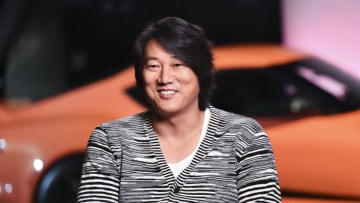 UNIVERSAL CITY, CALIFORNIA - SEPTEMBER 15: Sung Kang speaks during an interview at the F9 Fest event on the Universal Studios backlot celebrating F9: The Fast Saga (Director's Cut) on September 15, 2021 in Universal City, California. The F9: The Fast Saga (Director's Cut) will be available on Digital Now and releasing on Blu-ray Sept. 21, 2021. (Photo by Rodin Eckenroth/Getty Images for Universal Pictures Home Entertainment)
