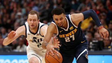 DENVER, CO - NOVEMBER 03: Jamal Murray #27 of the Denver Nuggets drives to the basket against Joe Ingles #2 of the Utah Jazz in the first quarter at the Pepsi Center on November 3, 2018 in Denver, Colorado. (Photo by Matthew Stockman/Getty Images)