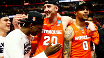 CHICAGO, IL - MARCH 27: Tyler Lydon #20 and Michael Gbinije #0 of the Syracuse Orange celebrate their 68 to 62 win over the Virginia Cavaliers during the 2016 NCAA Men's Basketball Tournament Midwest Regional Final at United Center on March 27, 2016 in Chicago, Illinois. (Photo by Jamie Squire/Getty Images)