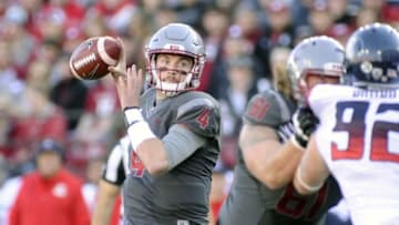 Nov 5, 2016; Pullman, WA, USA; Washington State Cougars quarterback Luke Falk (4) looks to pass against the Arizona Wildcats during the first half at Martin Stadium. Mandatory Credit: James Snook-USA TODAY Sports