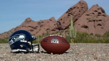 Jan 28, 2015; Tempe, AZ, USA; General view of Seattle Seahawks helmet and Super XLIX logo football at Papago Park. Mandatory Credit: Kirby Lee-USA TODAY Sports