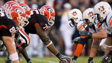 Auburn footballNov 10, 2007; Athens, GA, USA; The Georgia Bulldogs offense lines up against the Auburn Tigers defense during the first quarter at Sanford Stadium in Athens, Georgia. Georgia defeated Auburn 45-20. Mandatory Credit: Paul Abell-USA TODAY Sports