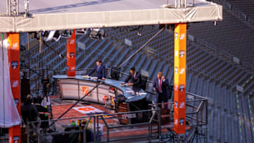 ESPN College GameDay hosts (left to right) Rece Davis, David Pollack and Kirk Herbstreit prepare for their live broadcast. (Photo by Matt Cashore-Pool/Getty Images)