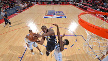 LAS VEGAS, NV - JULY 14: Jalen Jones adjusts midair for a shot. Photo credit: David Dow, NBAE for Getty Images