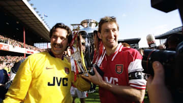 3 May 1998: David Seaman of Arsenal and club captain Tony Adams hold the championship trophy after the FA Carling Premiership match against Everton at Highbury in London. Arsenal won 4-0 to secure the title. Mandatory Credit: Ben Radford /Allsport