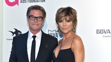 WEST HOLLYWOOD, CA - MARCH 04: Harry Hamlin (L) and Lisa Rinna attend the 26th annual Elton John AIDS Foundation's Academy Awards Viewing Party at The City of West Hollywood Park on March 4, 2018 in West Hollywood, California. (Photo by Rodin Eckenroth/Getty Images)
