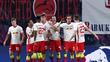 Leipzig celebrate their win hoover Gladbach (Photo by RONNY HARTMANN/POOL/AFP via Getty Images)