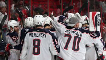 RALEIGH, NC - OCTOBER 10: The Columbus Blue Jackets celebrate their 2-1 victory over the Carolina Hurricanes following an overtime goal by Sonny Milano during of an NHL game on October 10, 2017 at PNC Arena in Raleigh, North Carolina. (Photo by Gregg Forwerck/NHLI via Getty Images)