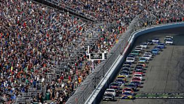 LOUDON, NH - SEPTEMBER 24: Martin Truex Jr., driver of the #78 Furniture Row/Denver Mattress Toyota, and Kyle Busch, driver of the #18 M&M's Caramel Toyota. (Photo by Jeff Zelevansky/Getty Images)
