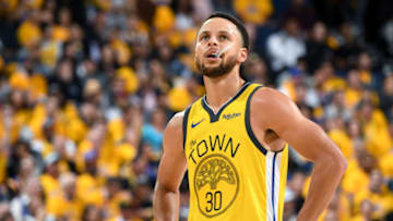 OAKLAND, CA - APRIL 15: Stephen Curry #30 of the Golden State Warriors looks on in Game Two of Round One against the LA Clippers during the 2019 NBA Playoffs on April 15, 2019 at ORACLE Arena in Oakland, California. NOTE TO USER: User expressly acknowledges and agrees that, by downloading and/or using this photograph, user is consenting to the terms and conditions of Getty Images License Agreement. Mandatory Copyright Notice: Copyright 2019 NBAE (Photo by Andrew D. Bernstein/NBAE via Getty Images)