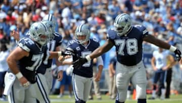 Sep 14, 2014; Nashville, TN, USA; Dallas Cowboys kicker Dan Bailey (5) is congratulated buy teammates after kicking a field goal against the Tennessee Titans during the first half at LP Field. Mandatory Credit: Jim Brown-USA TODAY Sports