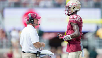 TALLAHASSEE, FL - OCTOBER 21: Head coach Jimbo Fisher of the Florida State Seminoles talks to quarterback James Blackman #1 of the Florida State Seminoles at Doak Campbell Stadium on October 21, 2017 in Tallahassee, Florida. (Photo by Michael Chang/Getty Images)