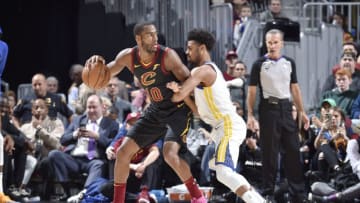 CLEVELAND, OH - DECEMBER 5: Alec Burks #10 of the Cleveland Cavaliers handles the ball against Quinn Cook #4 of the Golden State Warriors on December 5, 2018 at Quicken Loans Arena in Cleveland, Ohio. NOTE TO USER: User expressly acknowledges and agrees that, by downloading and/or using this Photograph, user is consenting to the terms and conditions of the Getty Images License Agreement. Mandatory Copyright Notice: Copyright 2018 NBAE (Photo by David Liam Kyle/NBAE via Getty Images)