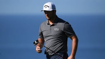 Jan 30, 2021; San Diego, California, USA; Jon Rahm looks on after a putt on the fourth green during the third round of the Farmers Insurance Open golf tournament at Torrey Pines Municipal Golf Course - South Course. Mandatory Credit: Orlando Ramirez-USA TODAY Sports