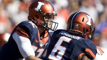 Sep 26, 2015; Champaign, IL, USA; Illinois Fighting Illini quarterback Wes Lunt (12) hands the ball off to running back Josh Ferguson (6) against Middle Tennessee at Memorial Stadium. Mandatory Credit: Mike Granse-USA TODAY Sports
