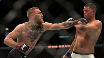 LAS VEGAS, NV - MARCH 5: (L-R) Conor McGregor punches Nate Diaz in their welterweight bout during the UFC 196 in the MGM Grand Garden Arena on March 5, 2016 in Las Vegas, Nevada. (Photo by Brandon Magnus/Zuffa LLC/Zuffa LLC via Getty Images)