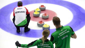 SOCHI, RUSSIA - NOVEMBER 12, 2017: Polina Bikker and Petr Dron of Adamant St Petersburg Team compete against Ildiko Szekeres and Gyeorgy Nagy of Hungary in their bronze medal match at the the Sochi International Mixed Doubles event of the 2017/18 World Curling Tour (WCT) at the Ice Cube curling centre. Valery Sharifulin/TASS (Photo by Valery Sharifulin\TASS via Getty Images)