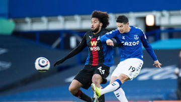 LIVERPOOL, ENGLAND - APRIL 05: Jairo Riedewald of Crystal Palace and James Rodriguez of Everton in action during the Premier League match between Everton and Crystal Palace at Goodison Park on April 5, 2021 in Liverpool, United Kingdom. Sporting stadiums around the UK remain under strict restrictions due to the Coronavirus Pandemic as Government social distancing laws prohibit fans inside venues resulting in games being played behind closed doors. (Photo by Sebastian Frej/MB Media/Getty Images)