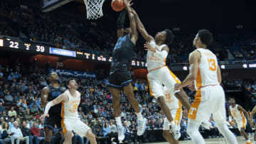 Nov 20, 2021; Uncasville, Connecticut, USA; Villanova Wildcats forward Jermaine Samuels (23) is fouled shooting the ball by Tennessee Volunteers guard Kennedy Chandler (1) during the second half at Mohegan Sun Arena. Mandatory Credit: Gregory Fisher-USA TODAY Sports