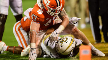 Sep 18, 2021; Clemson, South Carolina, USA; Clemson Tigers linebacker James Skalski (47) tackles Georgia Tech Yellow Jackets wide receiver Malachi Carter (7) at Memorial Stadium. Mandatory Credit: Adam Hagy-USA TODAY Sports
