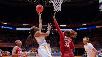 KNOXVILLE, TN - JANUARY 31: T'ea Cooper #20 of the Tennessee Lady Volunteers shoots against Diamante Martinez #35 of the Alabama Crimson Tide in a game at Thompson-Boling Arena on January 31, 2016 in Knoxville, Tennessee. (Photo by Patrick Murphy-Racey/Getty Images)