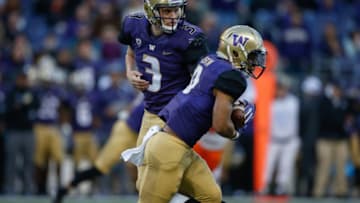 This is the fourth season QB Jake Browning and RB Myles Gaskin have played together at Washington. (Photo by Otto Greule Jr/Getty Images)