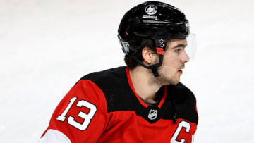 NEWARK, NEW JERSEY - FEBRUARY 20: Nico Hischier #13 of the New Jersey Devils skates during warm ups before the game against the Buffalo Sabres at Prudential Center on February 20, 2021 in Newark, New Jersey.Hischier is the newly elected team captain. (Photo by Elsa/Getty Images)