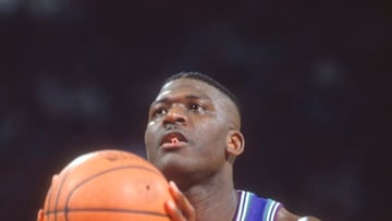 LANDOVER, MD - CIRCA 1995: Larry Johnson #2 of the Charlotte Hornets shoots a free throw against the Washington Bullets during an NBA basketball game circa 1995 at the US Airways Arena in Landover, Maryland. Johnson played for the Hornets from 1991-96. (Photo by Focus on Sport/Getty Images)