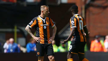 LONDON, ENGLAND - MAY 14: Kamil Grosicki of Hull City and Alfred N'Diaye of Hull City react to Crystal Palace scoring their sides first goal during the Premier League match between Crystal Palace and Hull City at Selhurst Park on May 14, 2017 in London, England. (Photo by Steve Bardens/Getty Images)