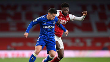 LONDON, ENGLAND - APRIL 23: James Rodriguez of Everton takes on Thomas Partey of Arsenal during the Premier League match between Arsenal and Everton at Emirates Stadium on April 23, 2021 in London, England. Sporting stadiums around the UK remain under strict restrictions due to the Coronavirus Pandemic as Government social distancing laws prohibit fans inside venues resulting in games being played behind closed doors. (Photo by Justin Setterfield/Getty Images)
