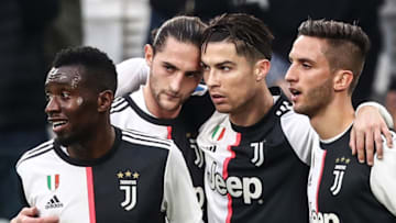 Juventus' Portuguese forward Cristiano Ronaldo (C) celebrates with (From L) Juventus' French midfielder Blaise Matuidi, Juventus' French midfielder Adrien Rabiot and Juventus' Uruguayan midfielder Rodrigo Bentancur after scoring during the Italian Serie A football match Juventus vs Udinese on December 15, 2019 at the Juventus Allianz stadium in Turin. (Photo by Isabella BONOTTO / AFP) (Photo by ISABELLA BONOTTO/AFP via Getty Images)