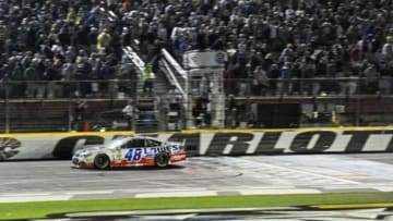 May 18, 2013; Concord, NC, USA; NASCAR Sprint Cup Series driver Jimmie Johnson (48) crosses the finish line after the Sprint All-Star Race at Charlotte Motor Speedway. Mandatory Credit: Sam Sharpe-USA TODAY Sports