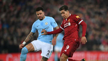 LIVERPOOL, ENGLAND - JANUARY 14: Kyle Walker of Manchester City and Roberto Firmino of Liverpool battles for possesion during the Premier League match between Liverpool and Manchester City at Anfield on January 14, 2018 in Liverpool, England. (Photo by Shaun Botterill/Getty Images)