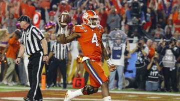 Dec 31, 2016; Phoenix, AZ, USA; Clemson Tigers quarterback Deshaun Watson (4) runs the ball for a touchdown against Ohio State during the third quarter during the 2016 CFP semifinal at University of Phoenix Stadium. Mandatory Credit: David Kadlubowski/The Arizona Republic via USA TODAY Sports