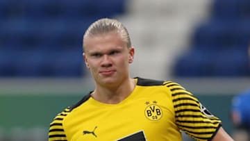 Dortmund's Norwegian forward Erling Braut Haaland celebrates scoring the 0-1 during the German first division Bundesliga football match between TSG Hoffenheim and Borussia Dortmund in Sinsheim on January 22, 2022. - DFL REGULATIONS PROHIBIT ANY USE OF PHOTOGRAPHS AS IMAGE SEQUENCES AND/OR QUASI-VIDEO (Photo by Daniel ROLAND / AFP) / DFL REGULATIONS PROHIBIT ANY USE OF PHOTOGRAPHS AS IMAGE SEQUENCES AND/OR QUASI-VIDEO (Photo by DANIEL ROLAND/AFP via Getty Images)