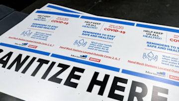 LAS VEGAS, NEVADA - MAY 18: Corrugated plastic signs with guidelines for how to stay safe from the coronavirus made for Allegiant Stadium are stacked at Screaming Images on May 18, 2020 in Las Vegas, Nevada. The Las Vegas company usually works on large-scale graphic designs and installations for customers like Las Vegas resorts. After the COVID-19 pandemic shut down nonessential businesses, they designed and began manufacturing recyclable, clear acrylic safety shield dividers for various table games and slot machines to help protect employees and customers once hotel-casinos in the state are allowed to reopen. (Photo by Ethan Miller/Getty Images)