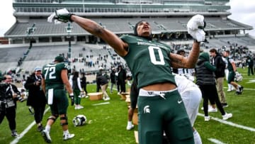 Michigan State's Keon Coleman throws tee-shirts to fans at the end of the spring game on Saturday, April 16, 2022, at Spartan Stadium in East Lansing.220415 Msu Spring Game 366a