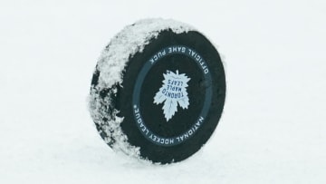 May 4, 2022; Toronto, Ontario, CAN; Game puck sits on the ice in game two of the first round of the 2022 Stanley Cup Playoffs between the Tampa Bay Lightning and Toronto Maple Leafs at Scotiabank Arena. Mandatory Credit: John E. Sokolowski-USA TODAY Sports