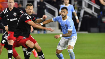 Apr 17, 2021; Washington, DC, Washington, DC, USA; D.C. United defender Frederic Brillant (13) and New York City FC midfielder Valentin Castellanos (11) track the ball during the second half at Audi Field. Mandatory Credit: Brad Mills-USA TODAY Sports