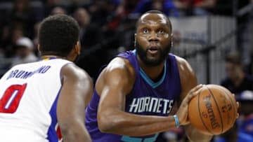 Mar 25, 2016; Auburn Hills, MI, USA; Charlotte Hornets center Al Jefferson (25) looks to take a shot against Detroit Pistons center Andre Drummond (0) during the first quarter at The Palace of Auburn Hills. Mandatory Credit: Raj Mehta-USA TODAY Sports