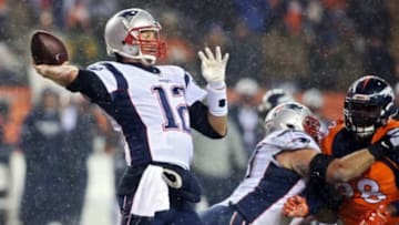 Nov 29, 2015; Denver, CO, USA; New England Patriots quarterback Tom Brady (12) throws a pass during the second half against the Denver Broncos at Sports Authority Field at Mile High. The Broncos won 30-24. Mandatory Credit: Chris Humphreys-USA TODAY Sports