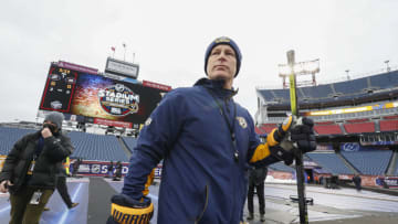 Head coach John Hynes of the Nashville Predators walks out to the ice for a practice session prior to the 2022 Navy Federal Credit Union NHL Stadium Series at Nissan Stadium on February 25, 2022 in Nashville, Tennessee. (Photo by Frederick Breedon/Getty Images)