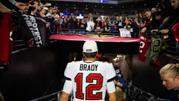 Detailed view of the jersey of Tampa Bay Buccaneers quarterback Tom Brady (12) as he walks off the field following the game against the Arizona Cardinals at State Farm Stadium. Mandatory Credit: Mark J. Rebilas-USA TODAY Sports