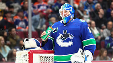 VANCOUVER, BC - DECEMBER 23: Vancouver Canucks Goalie Jacob Markstrom (25) takes a water break while playing the Edmonton Oilers during their NHL game at Rogers Arena on December 23, 2019 in Vancouver, British Columbia, Canada. (Photo by Devin Manky/Icon Sportswire via Getty Images)
