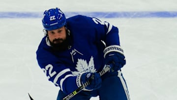 May 20, 2021; Toronto, Ontario, CAN; Toronto Maple Leafs defenseman Zach Bogosian (22) shoots the puck during warm up before game one of the first round of the 2021 Stanley Cup Playoffs against the Montreal Canadiens at Scotiabank Arena. Mandatory Credit: John E. Sokolowski-USA TODAY Sports