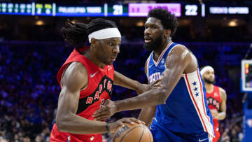 Toronto Raptors forward Precious Achiuwa (5) moves against Philadelphia 76ers center Joel Embiid (21)(Bill Streicher-USA TODAY Sports)