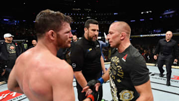 NEW YORK, NY - NOVEMBER 04: Georges St-Pierre of Canada and Michael Bisping of England shake hands after their UFC middleweight championship bout during the UFC 217 event at Madison Square Garden on November 4, 2017 in New York City. (Photo by Josh Hedges/Zuffa LLC/Zuffa LLC via Getty Images)